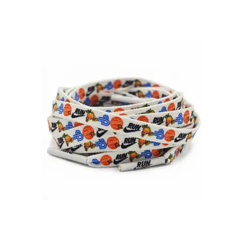 A coiled bundle of white shoelaces printed with a colorful pattern of basketballs, the word 'RUN', and Nike swooshes, on a solid white background.