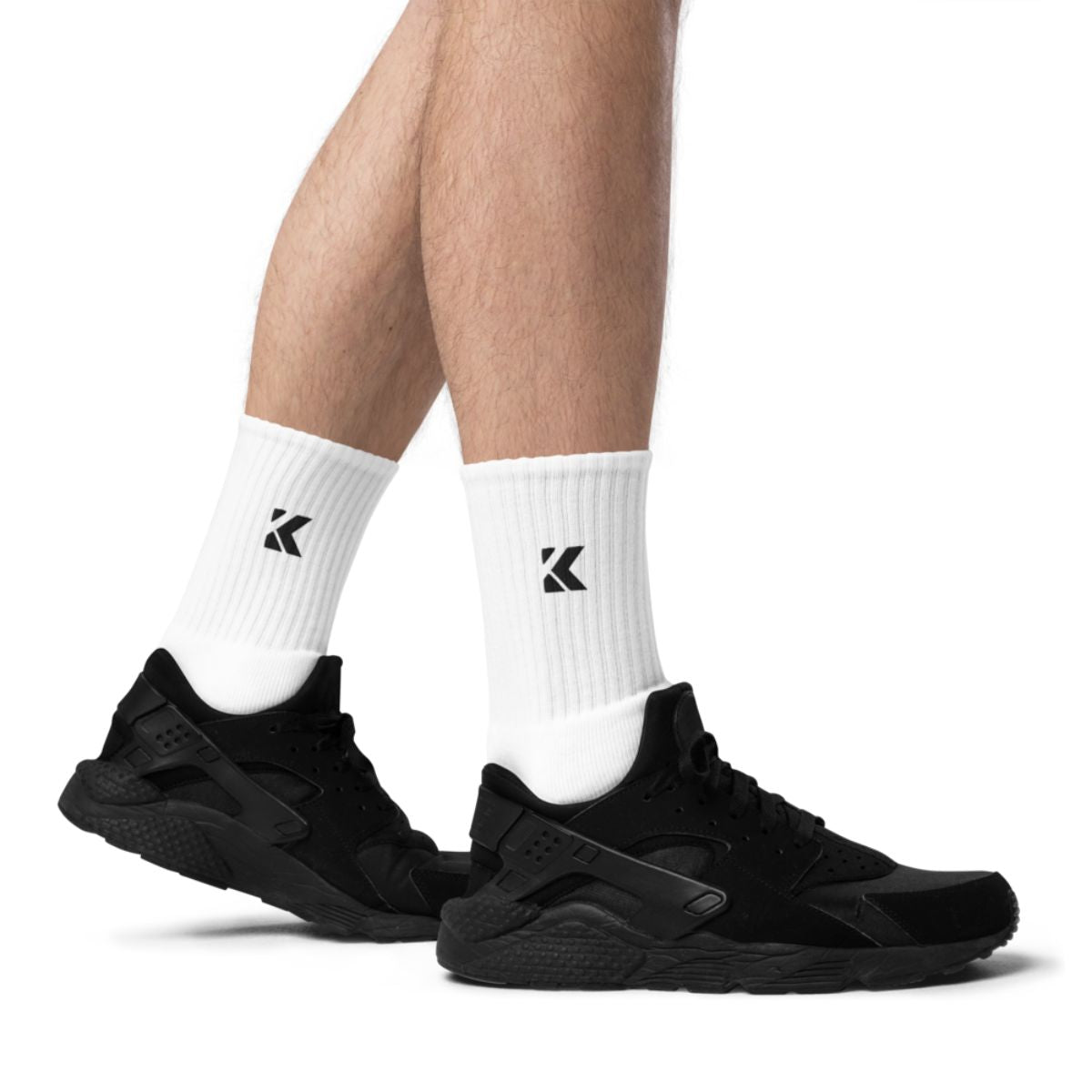 Kicks Cushioned Crew Socks paired with black sneakers showing all-day comfort and support