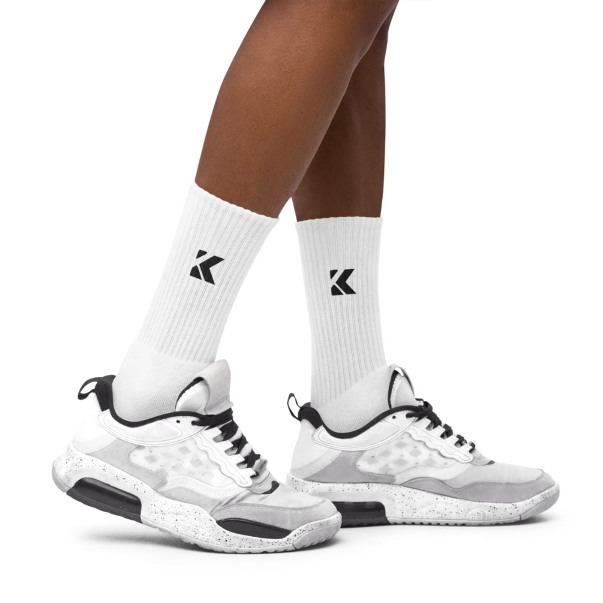Kicks Cushioned Crew Socks with white shoes showing breathable, snug fit