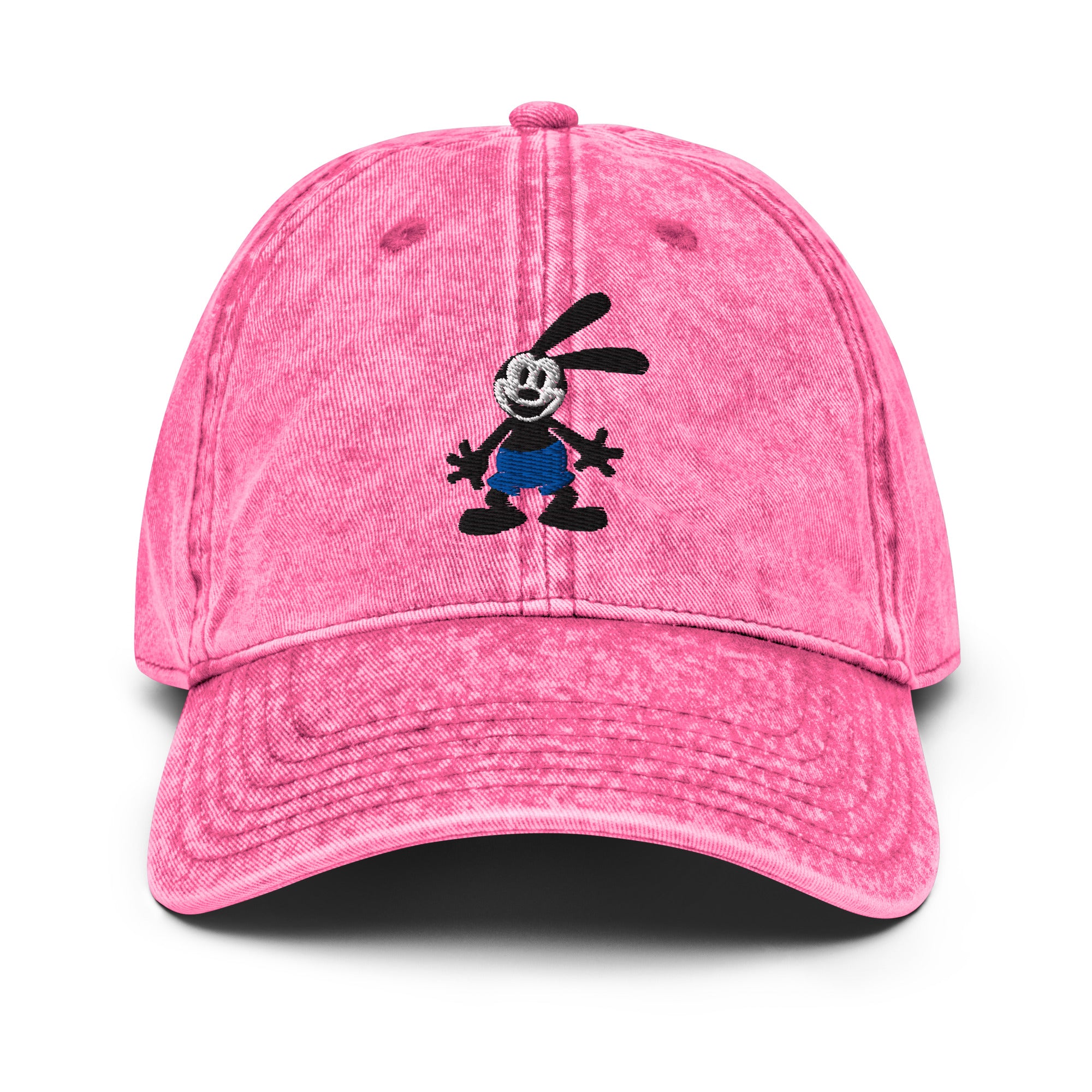 Pink vintage cap featuring a 1928 Oswald design from Disney’s early animation era on a washed-out hat