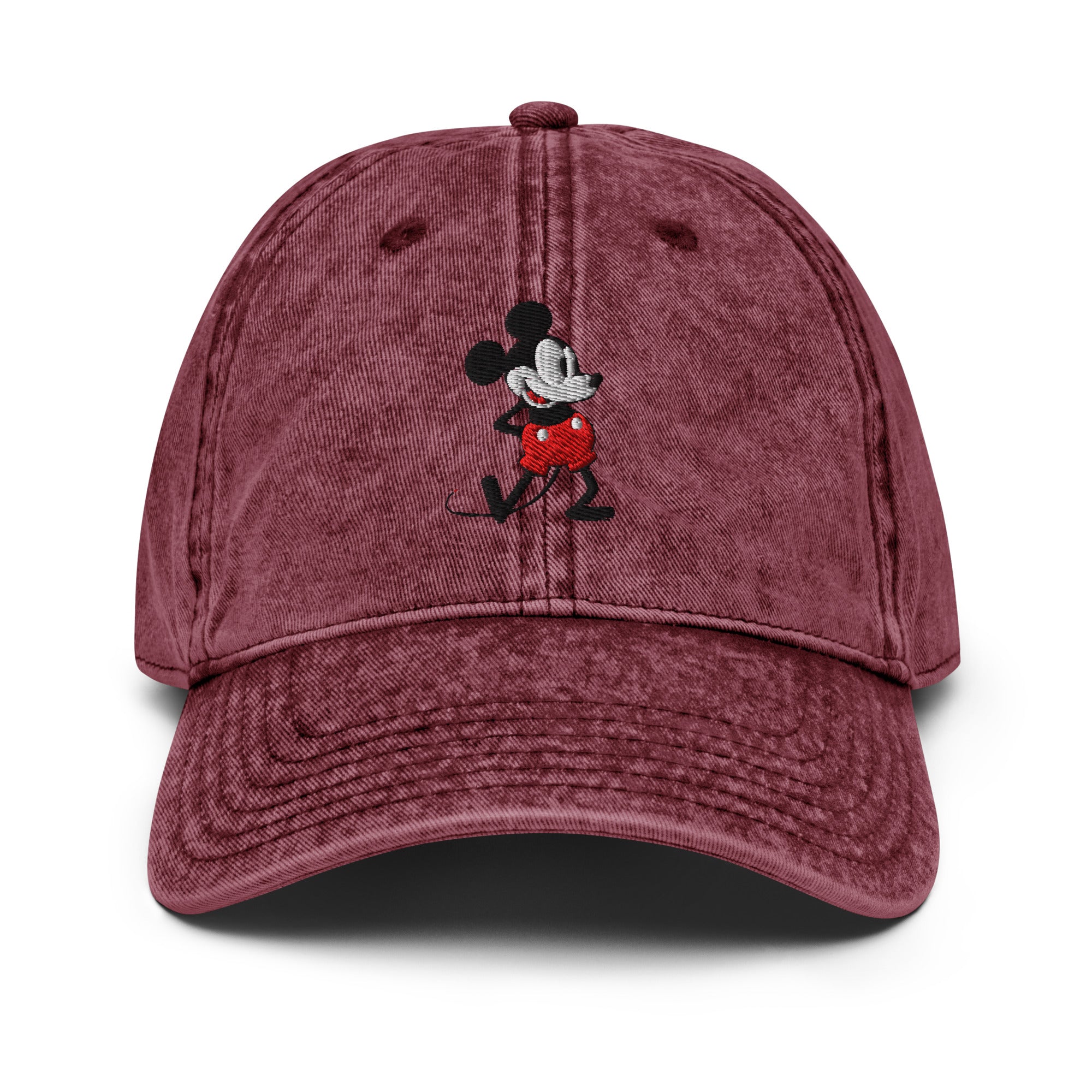 Maroon baseball cap with a 1928 Mickey Mouse steamboat willie cartoon character embroidered on it.