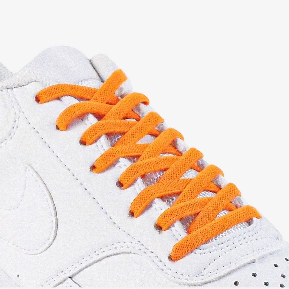 kids-no-tie-shoelaces-with-orange-laces-on-nike-white-sneakers-by-kicks-shoelaces