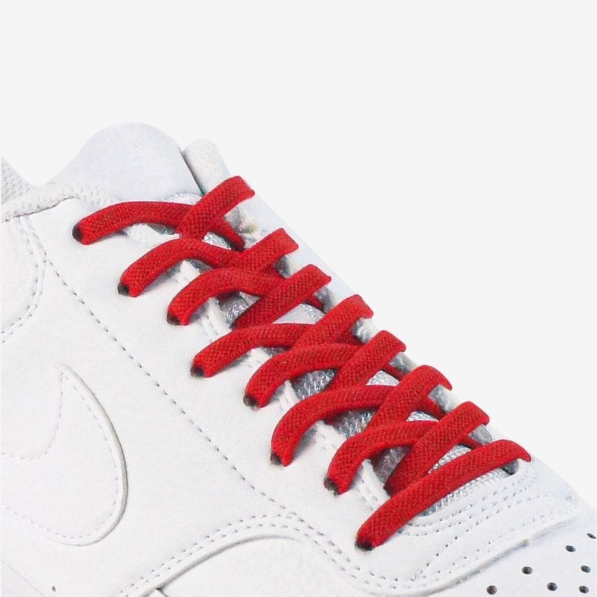 kids-no-tie-shoelaces-with-red-laces-on-nike-white-sneakers-by-kicks-shoelaces