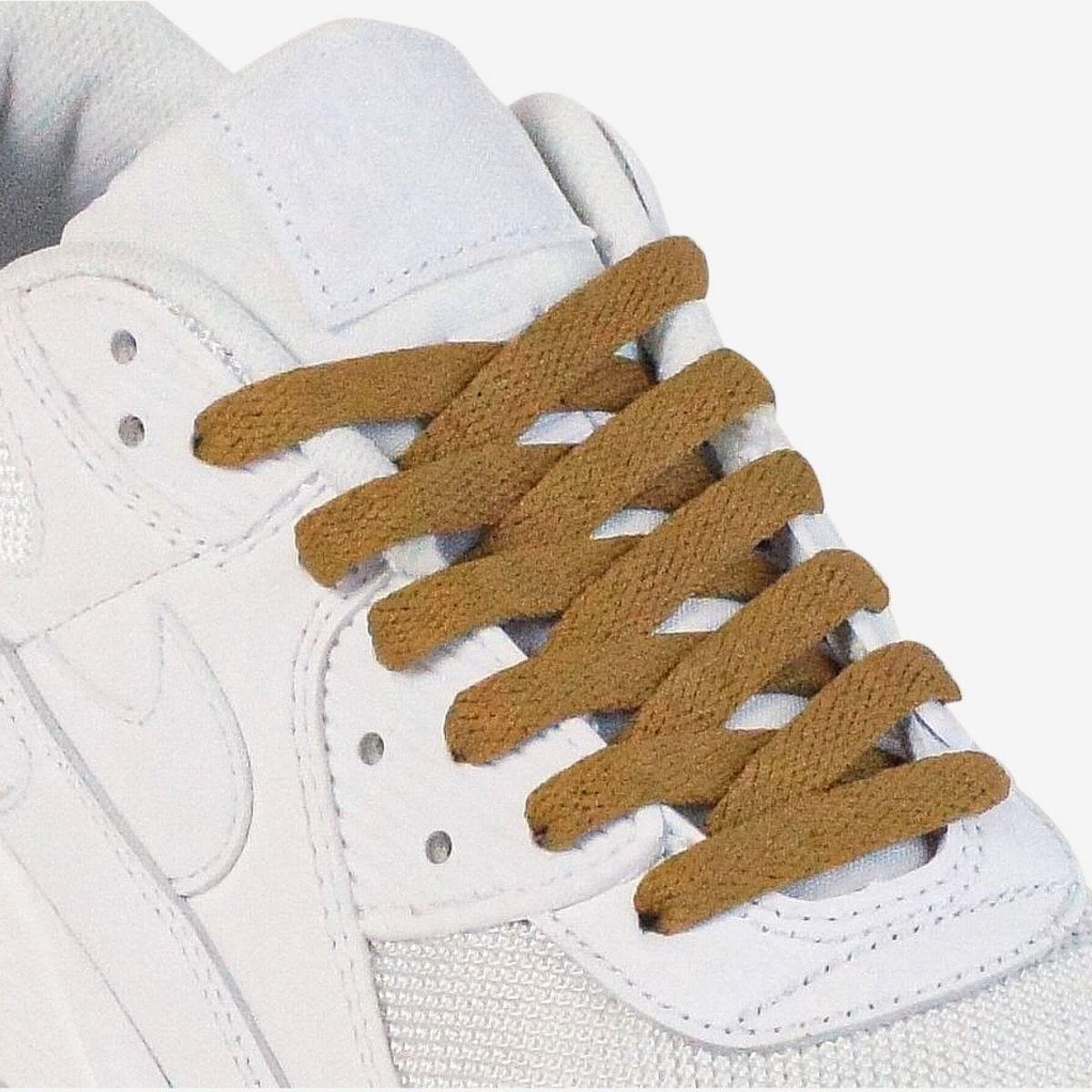 shoelace-patterns-on-womens-sneaker-using-brown-laces